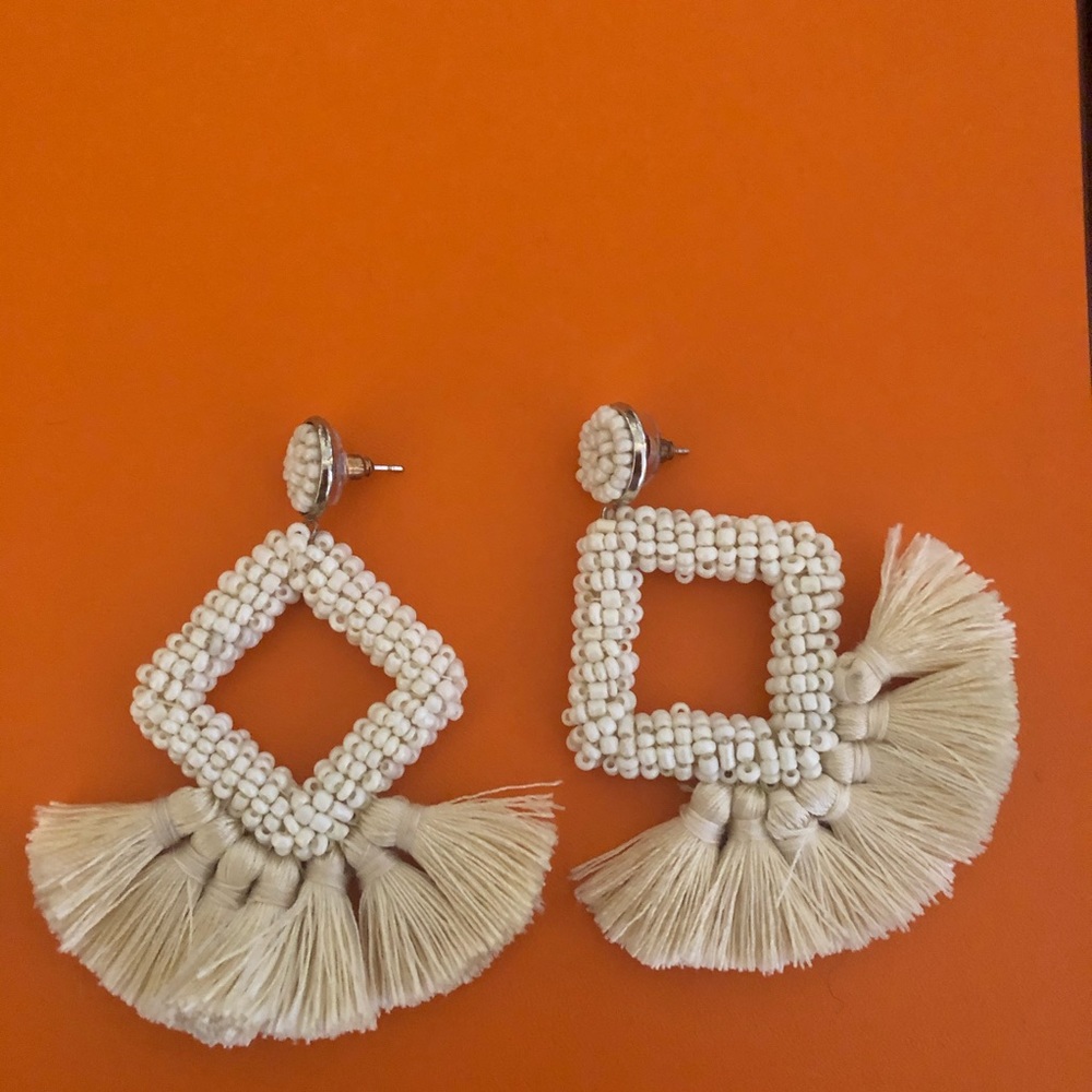 Fun white statement earrings